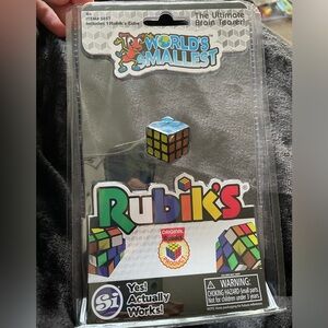 NWT - World’s Smallest Toy Rubik’s Cube. Fully sealed, never opened.